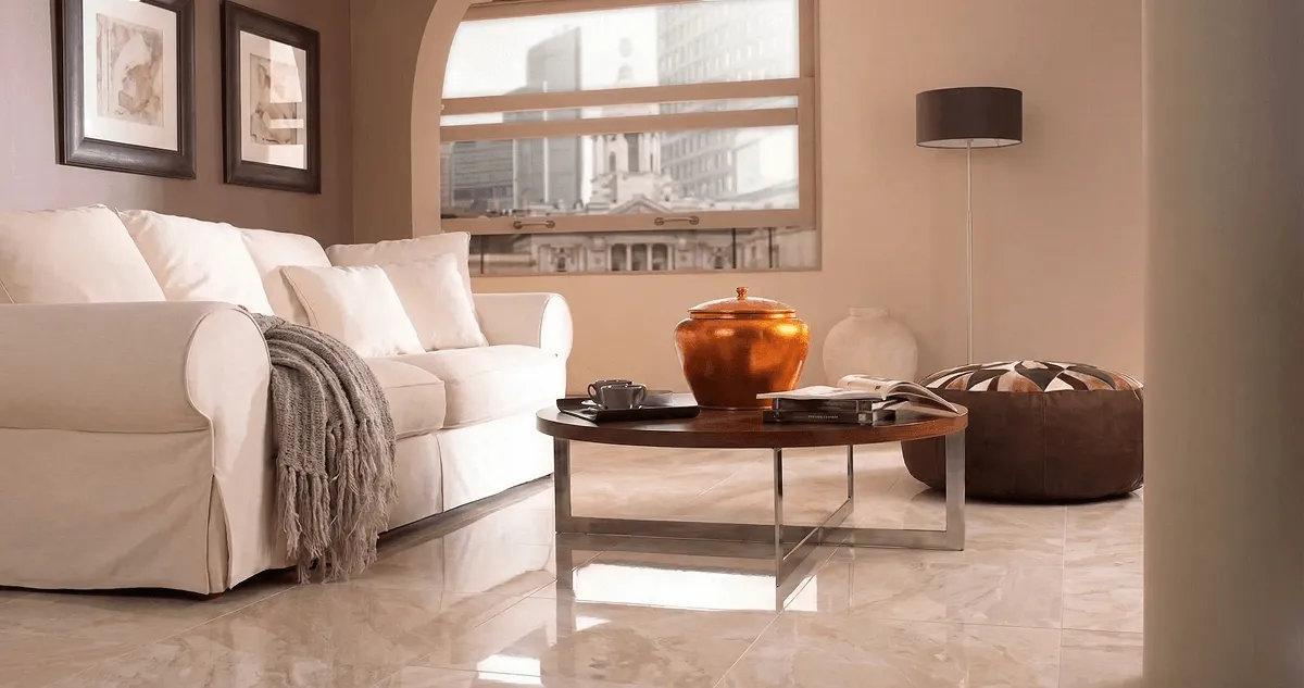 Modern living room with professionally installed marble flooring, a beige sofa, coffee table in Omaha, NE