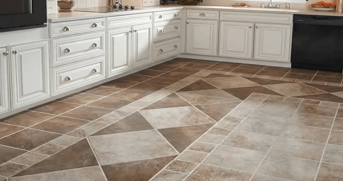 Kitchen with white cabinets and a professionally installed tile floor in Omaha, NE