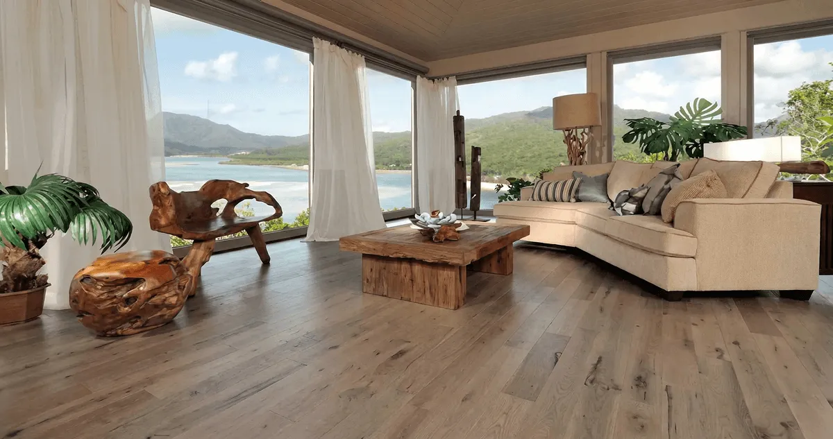 Professionally installed vinyl flooring in a modern living room with large windows in Omaha, NE
