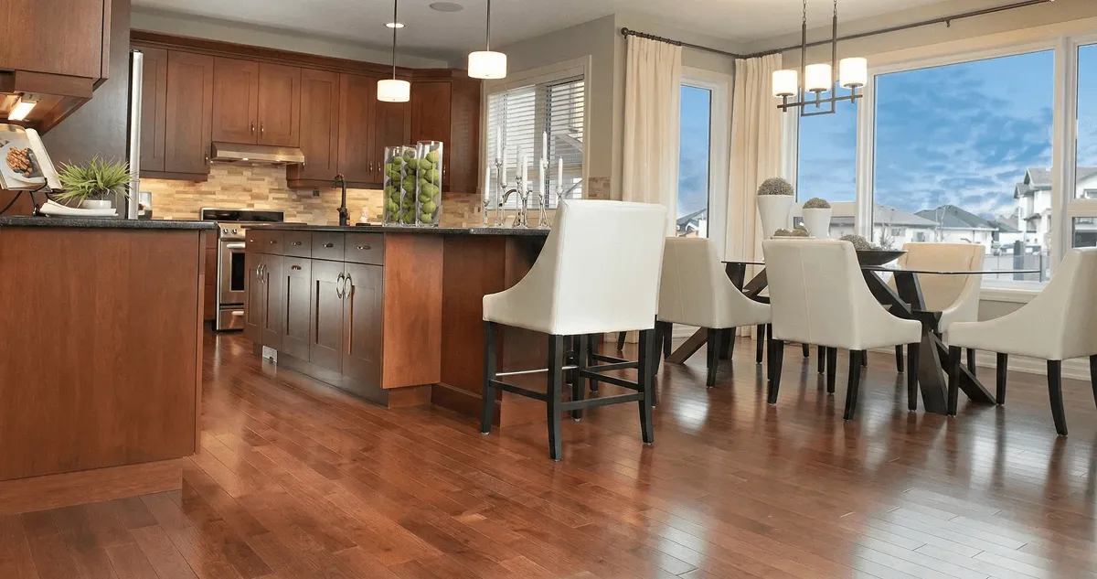 A modern kitchen with professionally installed wood flooring in Omaha, NE